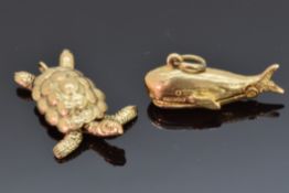 A 9ct gold charm depicting a whale opening to reveal Jonah and a 9ct gold charm depicting a