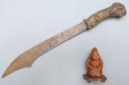 Japanese paper knife, length 31cm, and Japanese figure on stand