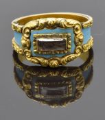 Victorian mourning ring set with plaited hair to the central glass compartment, with turquoise