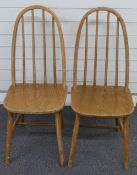 Two Ercol style light elm dining chairs