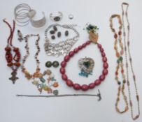 A collection of costume jewellery including beads, silver bracelet, agate necklace, silver Albert,