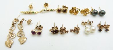 A collection of earrings including four 9ct gold pairs (3.5g), 9ct gold set with a pearl and diamond