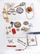 A collection of silver jewellery including ring, Scottish silver brooch by WBS, silver necklaces,