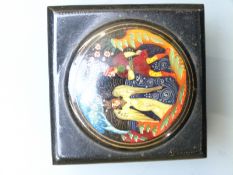 Russian lacquer box with mythical scene to lid and red interior, width 6cm