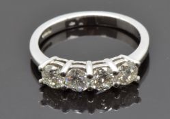 An 18ct white gold ring set with four diamonds each approximately 0.25cts, total carat weight
