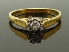 An 18ct gold ring set with a round cut diamond, size K/L, 2.19g