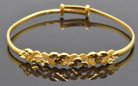 A yellow metal child's bangle marked 916 for 22ct gold, 6.6g