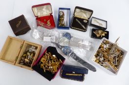 A collection of cufflinks and studs