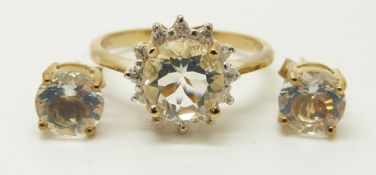 A 9ct gold ring set with a round cut ice opal and zircon and a pair of similar earrings, 3.2g,