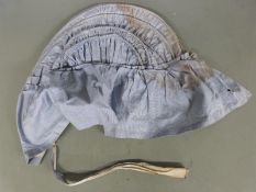 Victorian blue and white striped boned and frilled bonnet