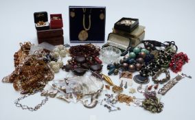 A collection of costume jewellery including beads, etc