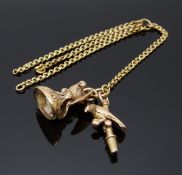 A section of Victorian chain with a watch key in the form of a parrot and a fob in the form of an