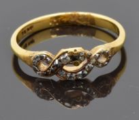 Victorian 18ct gold ring set with diamonds in the form of a serpent or snake, size Q