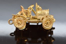 A 9ct gold pendant/charm in the form of a vintage car, 9g