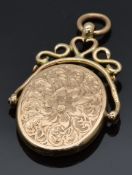 A 9ct rose gold locket with engraved decoration, Birmingham 1917, 3.9g