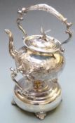 Ornate silver plated spirit kettle on stand with bird handle to teapot, height 34cm