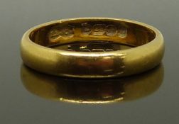 A 22ct gold wedding band/ ring, size L, 3.88g