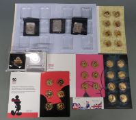 Gold plated collectable 50p coin sets in presentation packs to include Disney (Mickey Mouse etc)