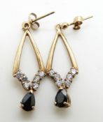 A pair of 9ct gold earrings set with sapphire and cubic zirconia, 2.3g