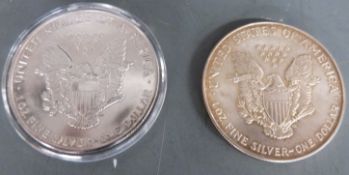Two USA one ounce fine silver walking Liberty dollars 1986 and 1994