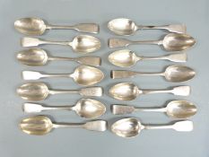Fourteen 19th century fiddle pattern hallmarked silver fiddle pattern dessert spoons, all but one