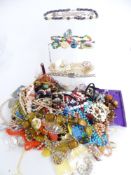 A collection of costume jewellery including silver locket, silver bracelet, beads, Sarah Coventry