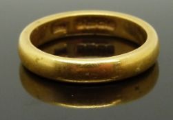 A 22ct gold wedding band/ ring, size L/M, 6.14g