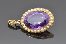 Edwardian 15ct gold pendant set with an oval cut amethyst and seed pearls, 2.2 x 1.7cm