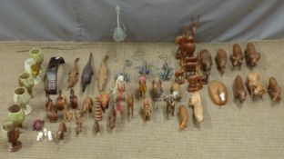 Quantity of tribal carved animals, marble or similar goblets etc