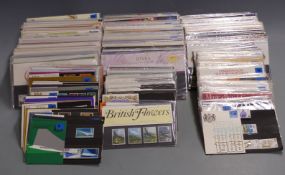A substantial collection of Great Britain presentation packs including many early examples