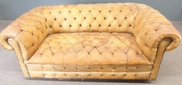 Brown leather Chesterfield two seat sofa, length 180cm