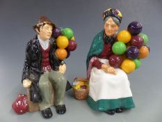 Two Royal Doulton Balloon Man and Woman figures, H 18cm