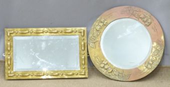 Two Arts and Crafts style bevelled glass mirrors with relief moulded decoration, 51x33cm and