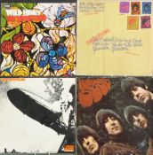 Approximately 35 albums including Led Zeppelin (1 and 2 both plum), The Beatles (With, Rubber Soul