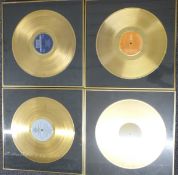 Four framed gold records - The Rolling Stones, Abba, Elvis Presley and Rod Stewart
