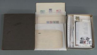 A collection of mint George VI stamps, early European stamps, a Strand album of all world stamps,