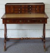 Reproduction leather inset desk with two drawers to front, the top fitted two cupboards and six