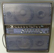 Roland Boss digital multi echo RE-1000 amplifier with speaker system.