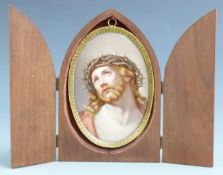 A late 19th/20thC Meissen porcelain plaque in brass frame, hand decorated with Christ and crown of