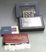 A boxed Royal Mail Millennium Collection and a 1992 Royal Commemorative album and stamps