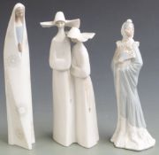 Two Lladro figures and a Nao figure, tallest 33cm
