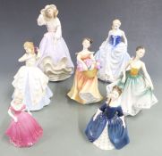 Seven Royal Doulton and Coalport figurines including 'Free as the Wind' from the Reflection