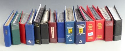 A box of 14 GB, Eire and Channel Islands first day covers in fourteen albums