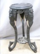 Indian or similar table or jardiniere stand, the legs formed as elephant heads and trunks, height
