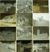 Approximately twenty late 19th/ early 20thC glass photographic negatives including ships in harbour,