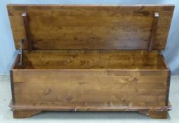 Modern coffee table or storage box with lift up compartment to one side and 12 drawers to the other,