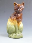 A large Ewenny Pottery cat with collar signed E Jenkins and 1896, H 39cm