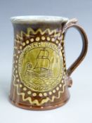 Peter Brown Snake Pottery of Cam, Dursley, Gloucestershire mug commemorating the Stroudwater