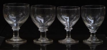 Four Georgian glass rummers with knopped stems, largest 14cm tall.