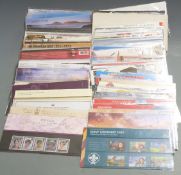 A large quantity of GB presentation packs (120+). High redeemable value in excess of £400